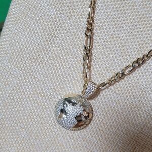 Elegant Gold and Silver Pendant Necklace